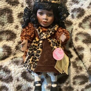 Musical wind up, animated, porcelain bisque, doll CHANTEL with COA